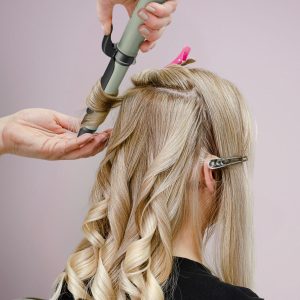 sage-cordless_curling_wand_in_use_-_roll_over